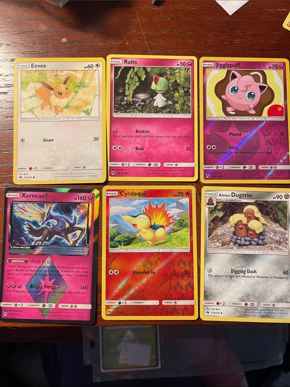 Pokémon Card Lot Featuring Eevee, Ralts, Jigglypuff & More